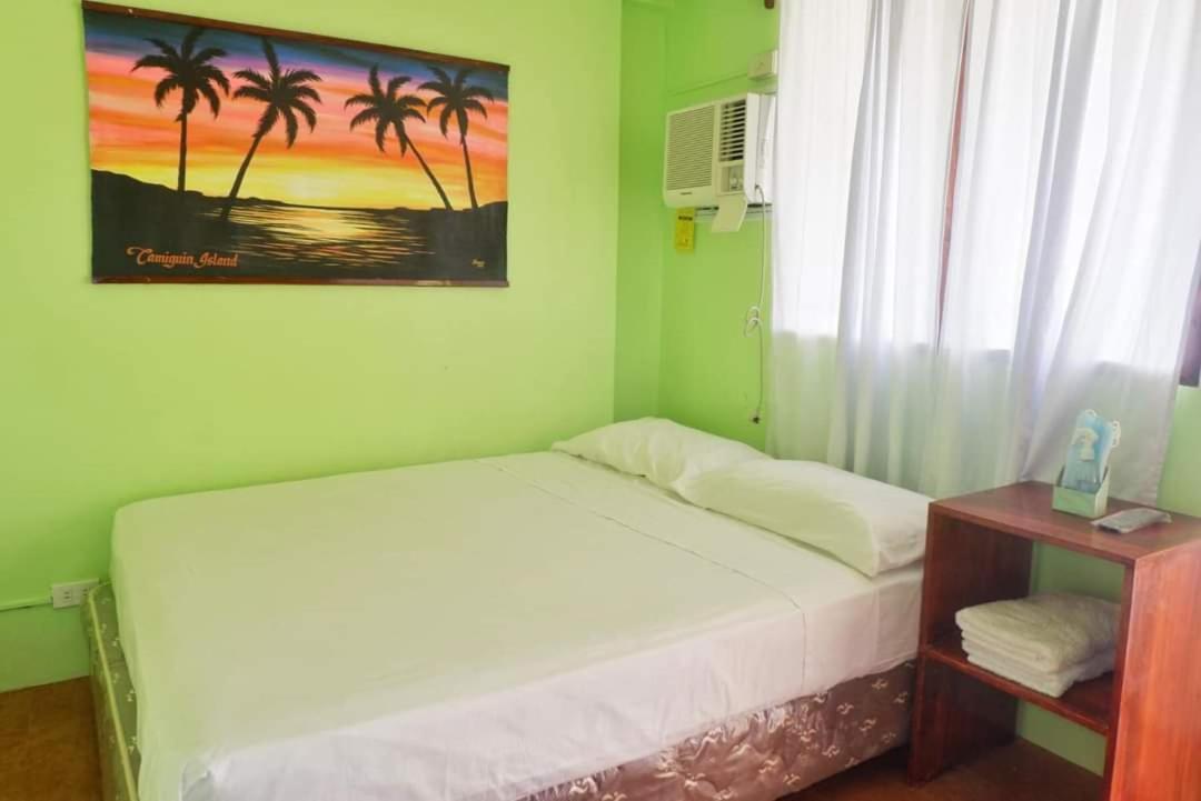 Puesta Del Sol Beach Bungalows And Restobar Mambajao Exterior photo